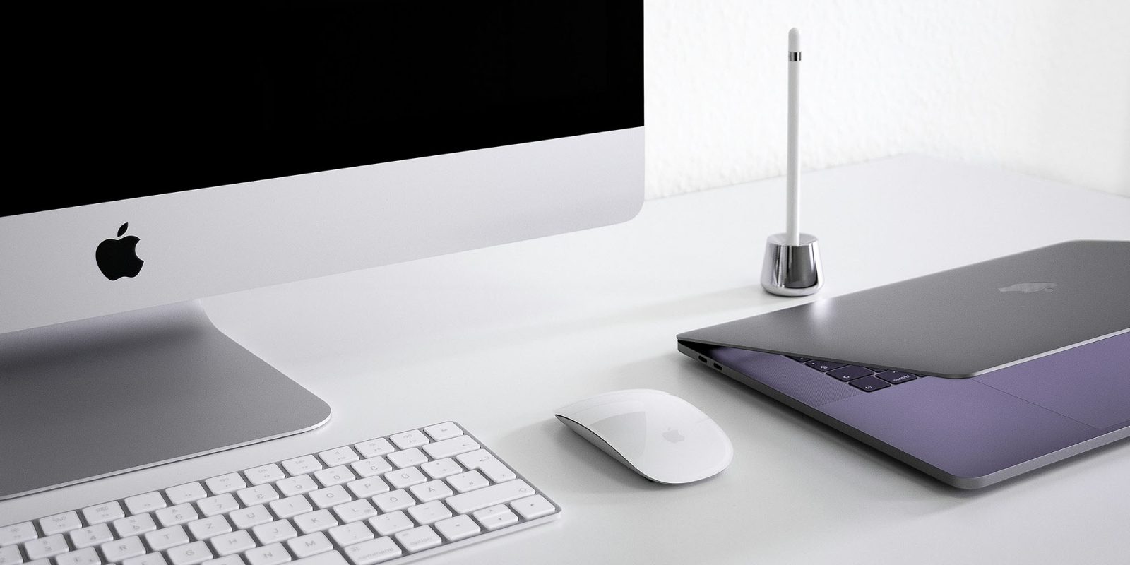 The eight reasons people upgrade Mac or PC, as shipments surge | MacBook and iMac on a desk