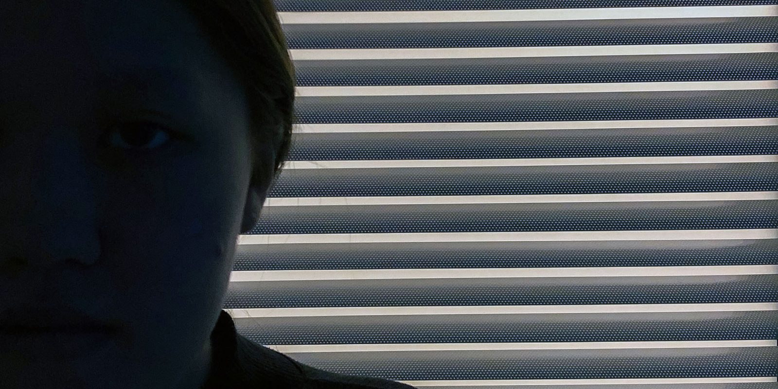 Major court ruling says social media apps are intentionally addictive | Stock image shows a teenage girl silhouetted against a window