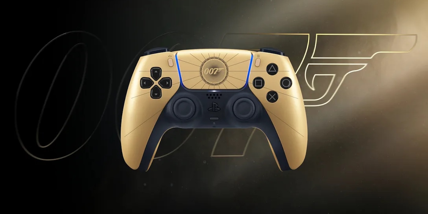 A gold and black video game controller