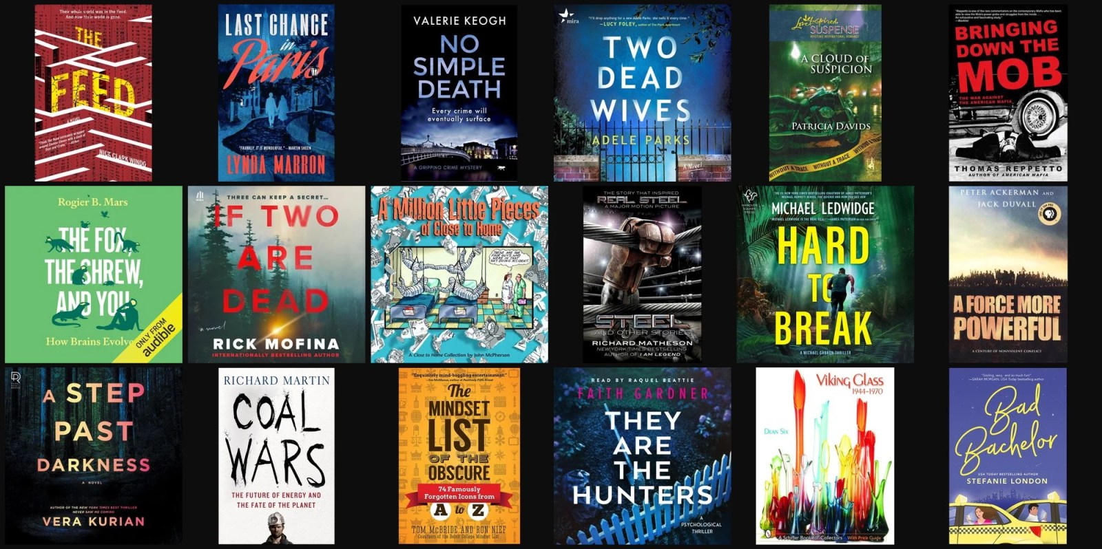 A collection of books on a black background