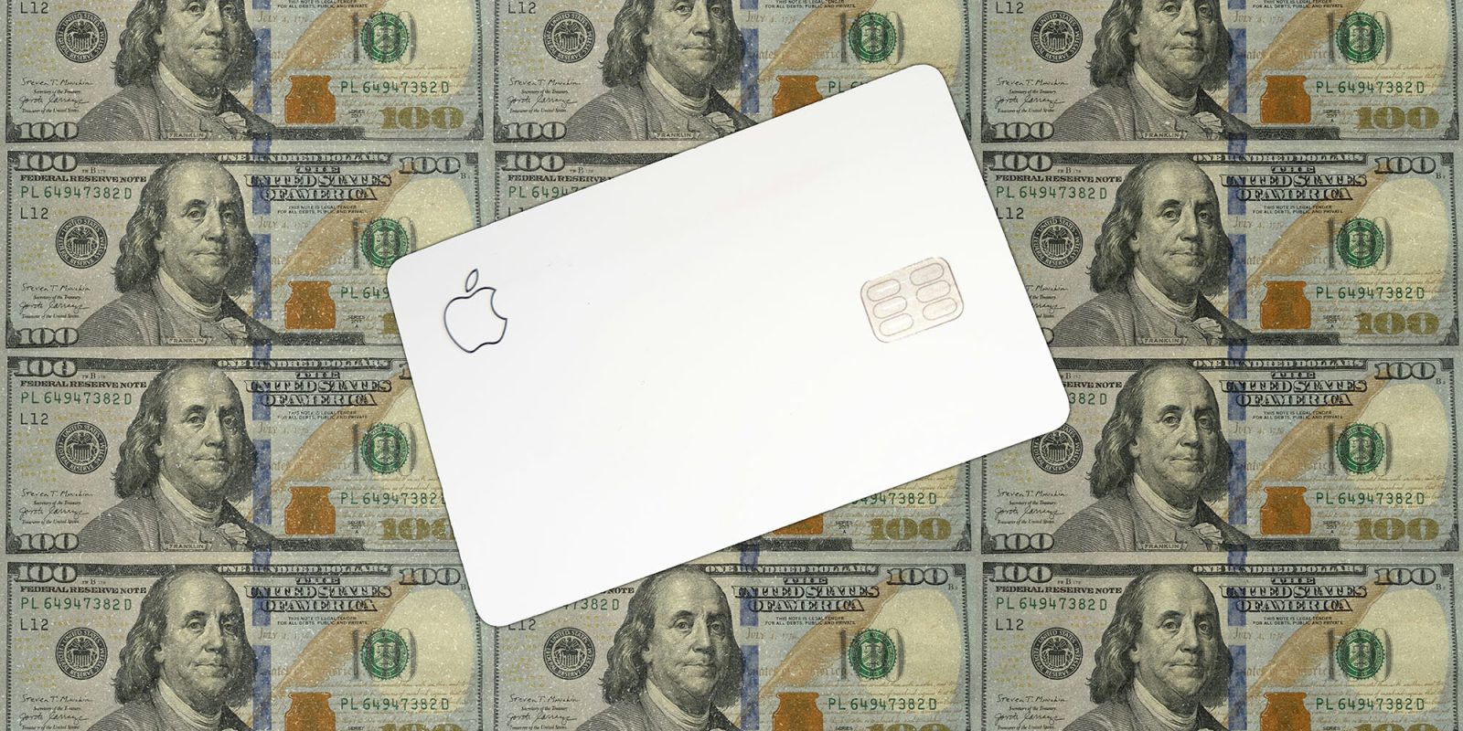 Apple says it faces world's largest antitrust fine as India's regulator hardens stance | Photo shows an Apple Card against a background of $100 bills