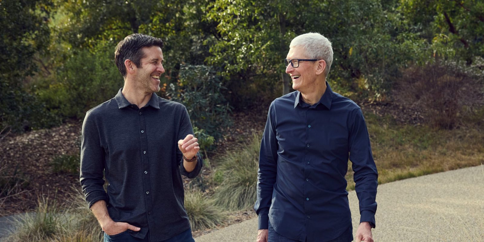 Tim Cook walking with John Ternus