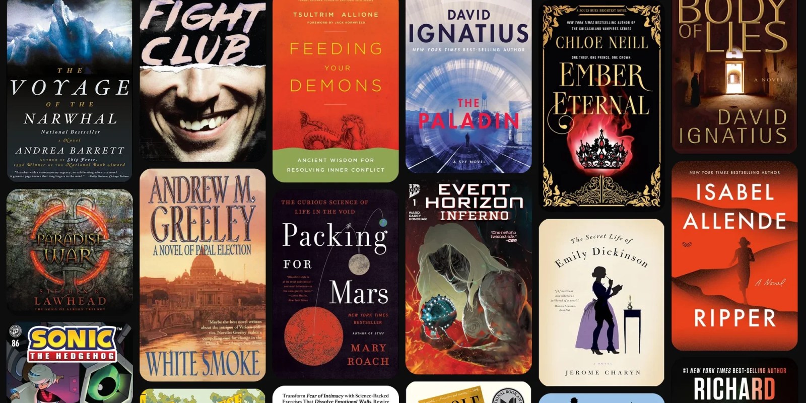 A collection of books on a black background