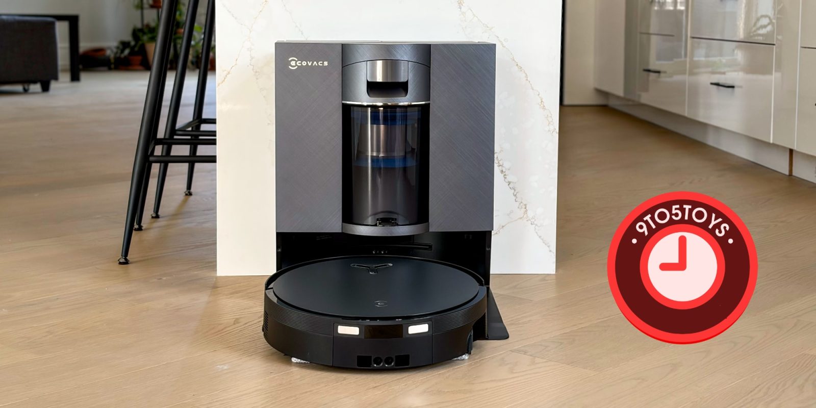 A robot vacuum cleaner on a wood floor