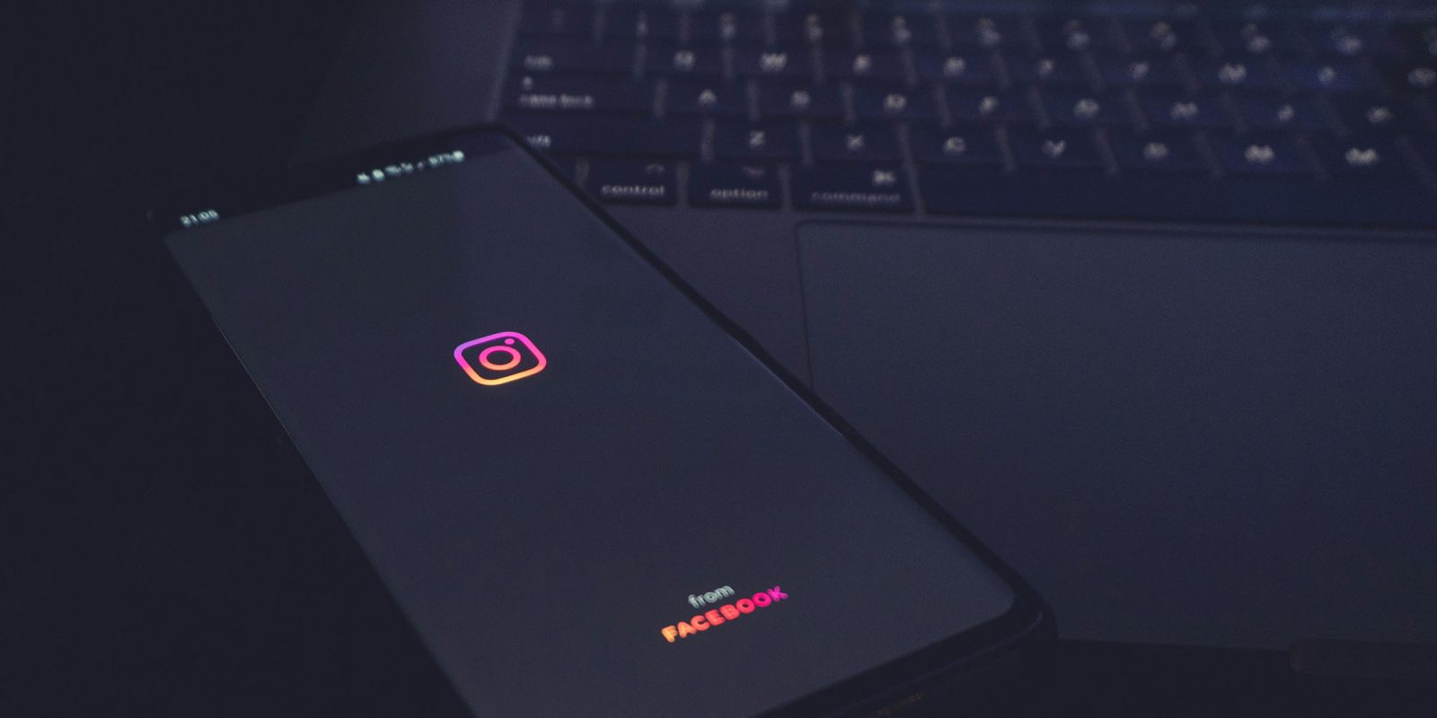 Hackers tricked Meta AI into letting them take over high-profile accounts | Low key photo shows the app opening on a smartphone placed on top of a MacBook keyboard