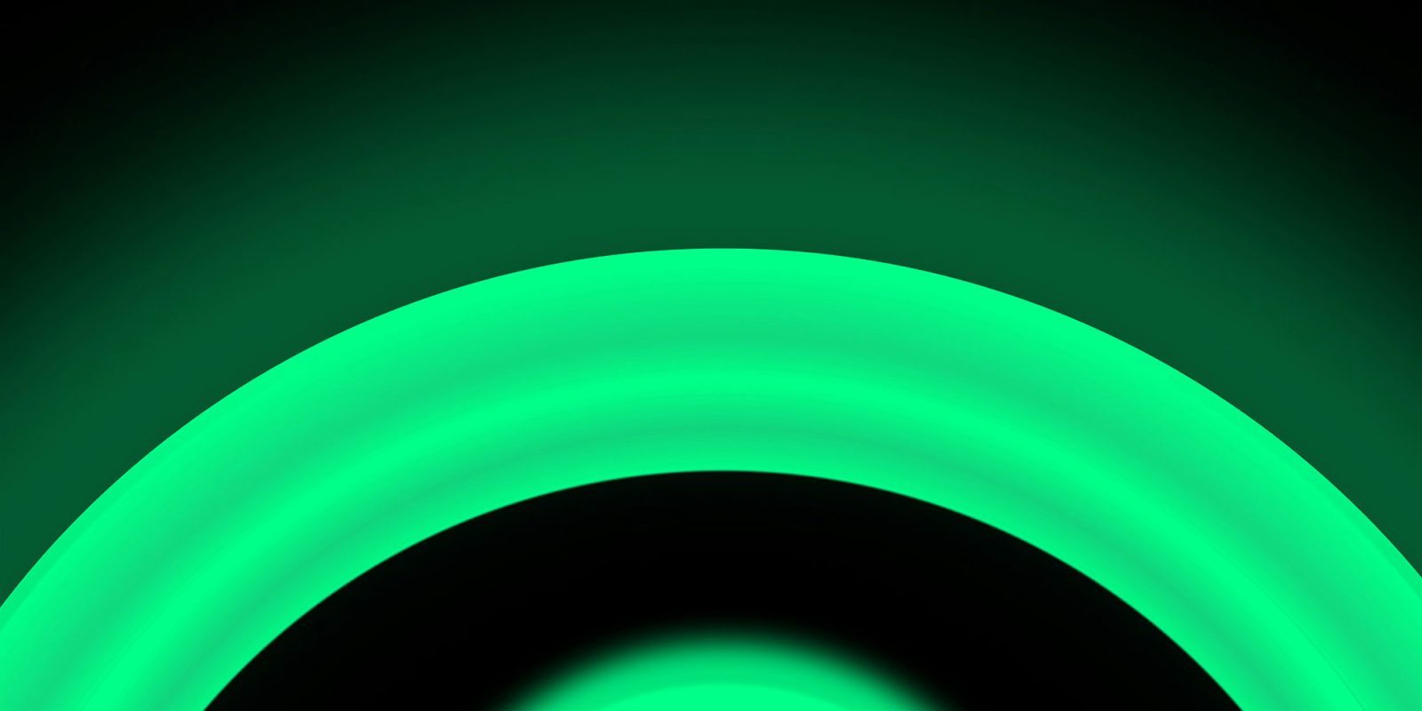 WhatsApp iPhone app getting a green dot to show who's online | Image shows a section of a vivid green circle