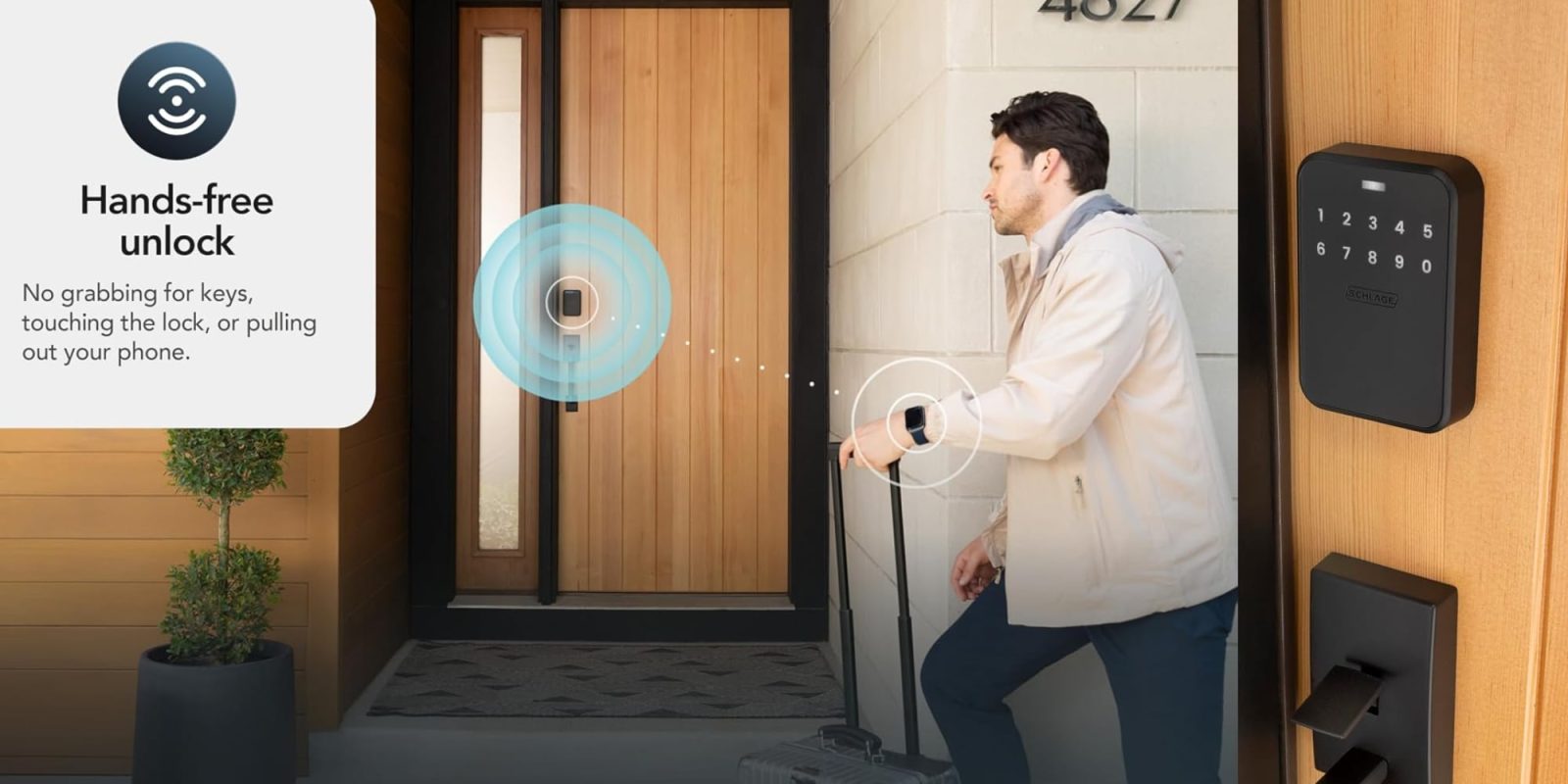 A man with a suitcase and a smart watch