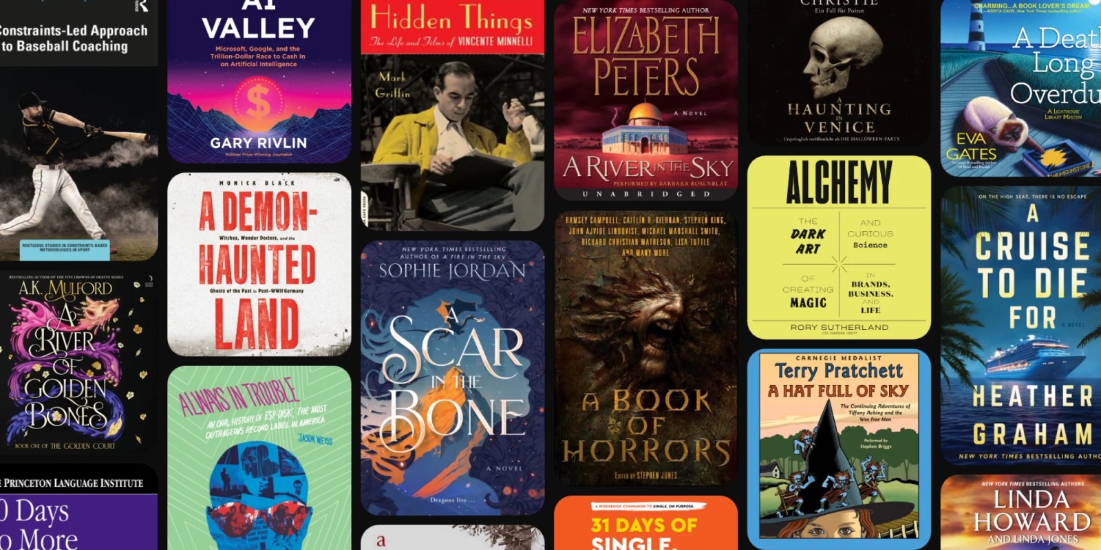 A collection of books on a black background