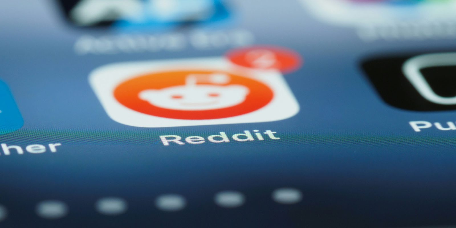 Reddit is making two changes some long-time users won't like | Photo shows a macro shot of the Reddit app icon on an iPhone